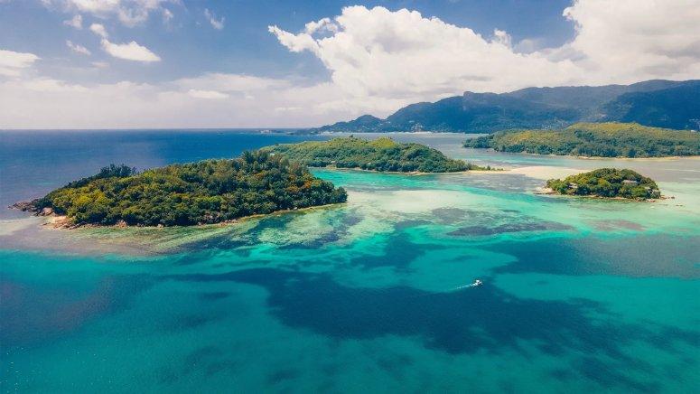 Aerial view of the green islands of St Anne Marine Park in the Seychelles