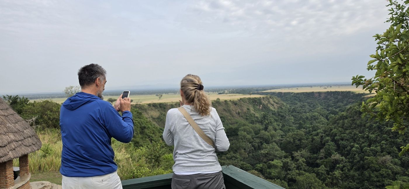 Guests looking over the Kazinga Gorge from a viewpoint in Queen Elizabeth National Park