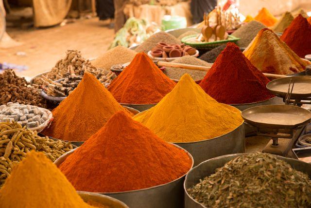 Heaps of colourful spices at a Zanzibar market